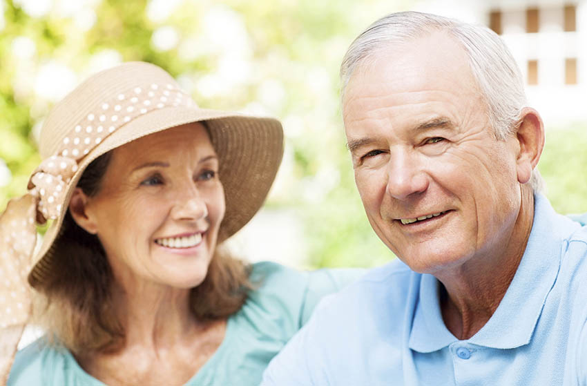 Close-up portrait of senior couple smiling in Aged Care